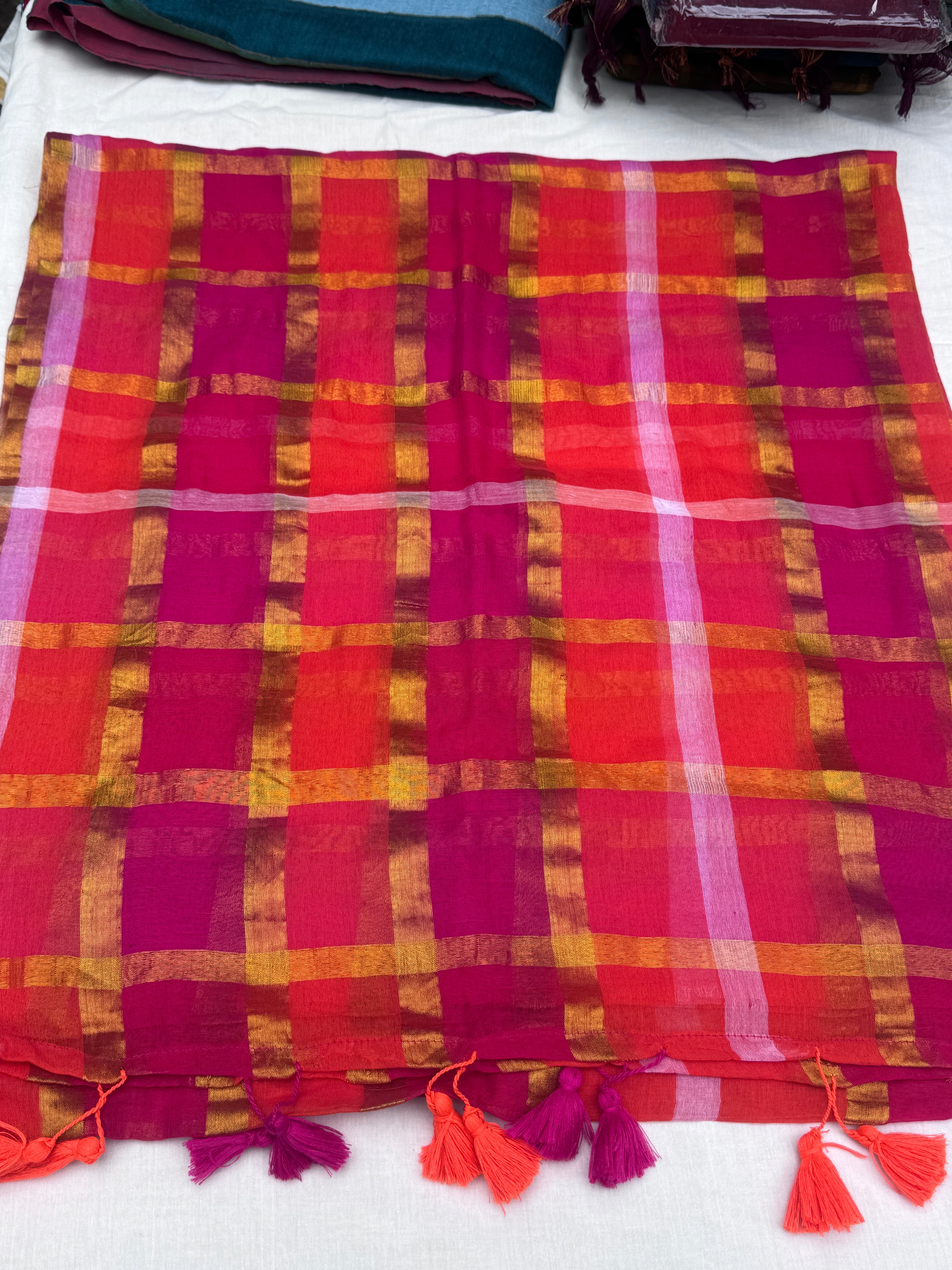 Orange and pink checkered mulcotton saree